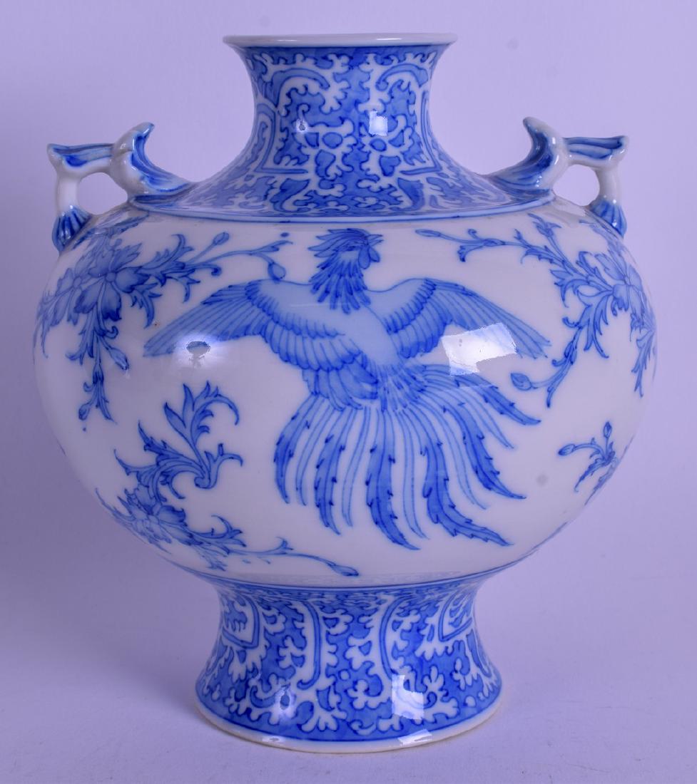 A 19TH CENTURY JAPANESE MEIJI PERIOD BLUE AND WHITE: A 19TH CENTURY JAPANESE MEIJI PERIOD BLUE AND WHITE VASE painted with a bird amongst foliage. 16 cm x 13 cm.