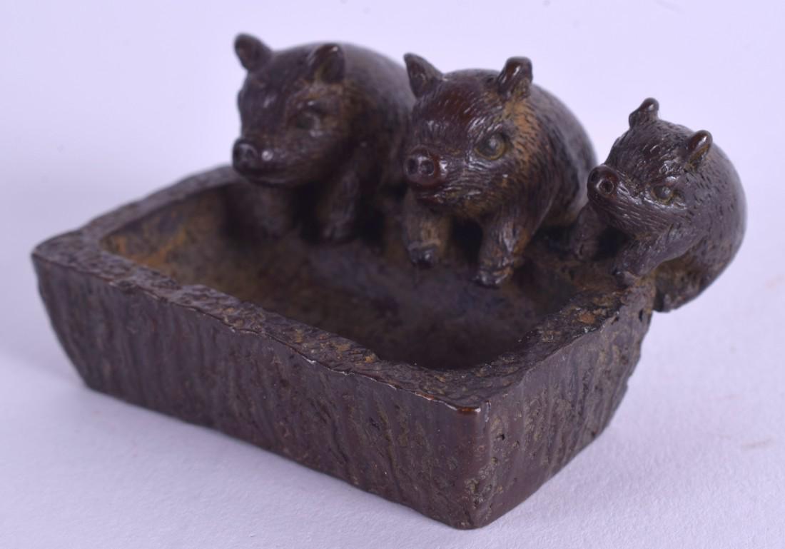 A JAPANESE BRONZE PIG TROUGH. 4.5 cm x 2.5 cm.: A JAPANESE BRONZE PIG TROUGH. 4.5 cm x 2.5 cm.