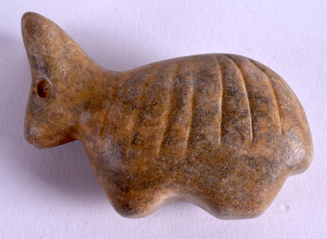 A CENTRAL ASIAN STONE IDOL. 7 cm x 4.5 cm. (1 of 3)