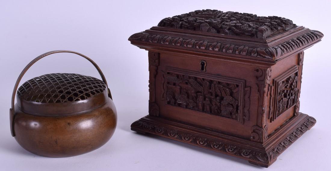 A 19TH CENTURY CHINESE CARVED SANDALWOOD CASKET Qing,: A 19TH CENTURY CHINESE CARVED SANDALWOOD CASKET Qing, together with a bronze censer. 16 cm & 9 cm wide. (2)