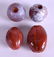 FOUR MIDDLE EASTERN AGATE TOGGLES. Largest 5 cm x 3.5