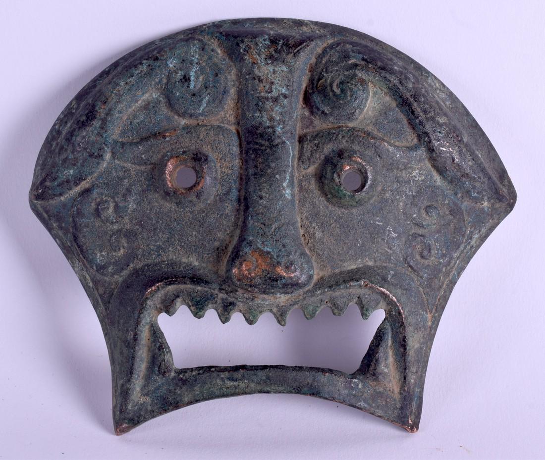A CHINESE TIBETAN BRONZE MASK HEAD. 13 cm x 11 cm. (1 of 2)