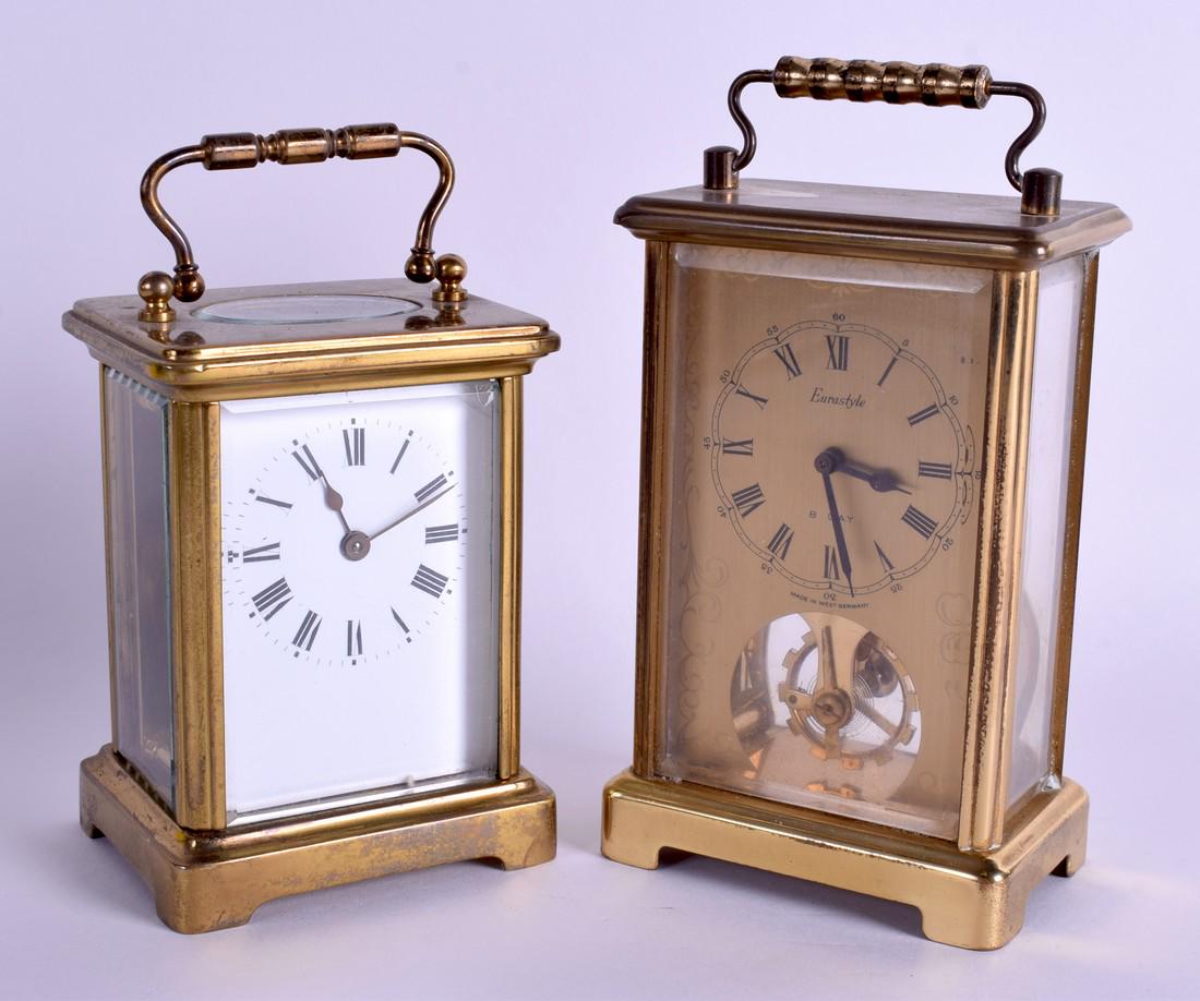 TWO BRASS CARRIAGE CLOCKS. 17 cm & 15 cm high inc (1 of 4)