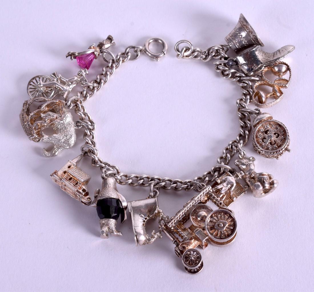 A SILVER CHARM BRACELET. 58 grams. (1 of 1)