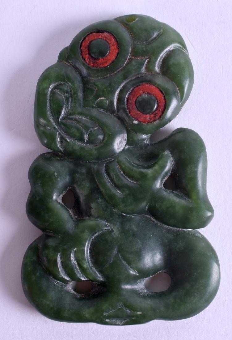 A LOVELY MAORI ANTHROPOMORPHIC PENDANT New Zealand,: A LOVELY MAORI ANTHROPOMORPHIC PENDANT New Zealand, 1600-1850, Pounamu (probably kawakawa variety). 9.5 cm x 5.5 cm.