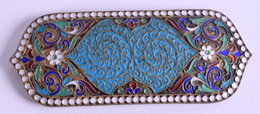 AN ANTIQUE RUSSIAN SILVER GILT AND ENAMEL BUCKLE. 10 cm: AN ANTIQUE RUSSIAN SILVER GILT AND ENAMEL BUCKLE. 10 cm x 3.5 cm.