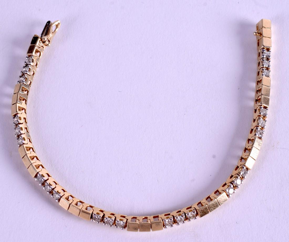 A 14CT GOLD AND DIAMOND SECTIONAL BRACELET diamond: A 14CT GOLD AND DIAMOND SECTIONAL BRACELET diamond approx. 1.5ct. 18 cm long and weight 17 grams.