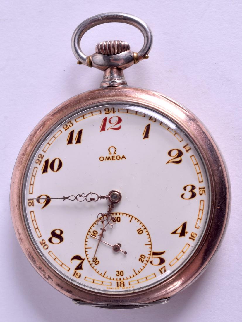 A VINTAGE OMEGA SILVER POCKET WATCH. 5.5 cm wide.: A VINTAGE OMEGA SILVER POCKET WATCH. 5.5 cm wide.