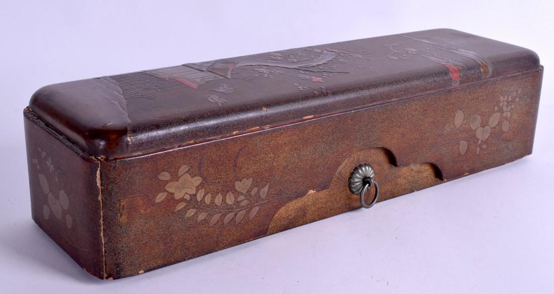 A 19TH CENTURY JAPANESE MEIJI PERIOD LACQUER BOX AND: A 19TH CENTURY JAPANESE MEIJI PERIOD LACQUER BOX AND COVER decorated with landscapes. 33 cm x 9 cm.