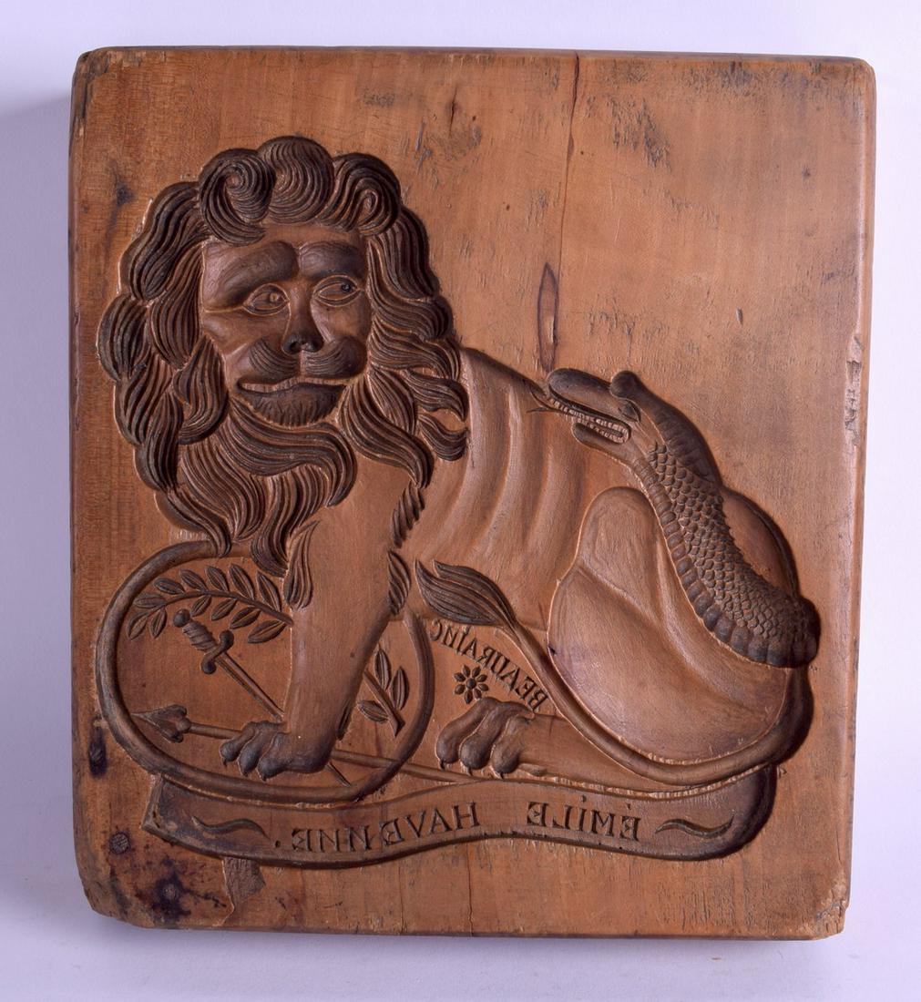 A CHARMING ANTIQUE TREEN FOLK ART CARVED WOOD CAKE (1 of 2)