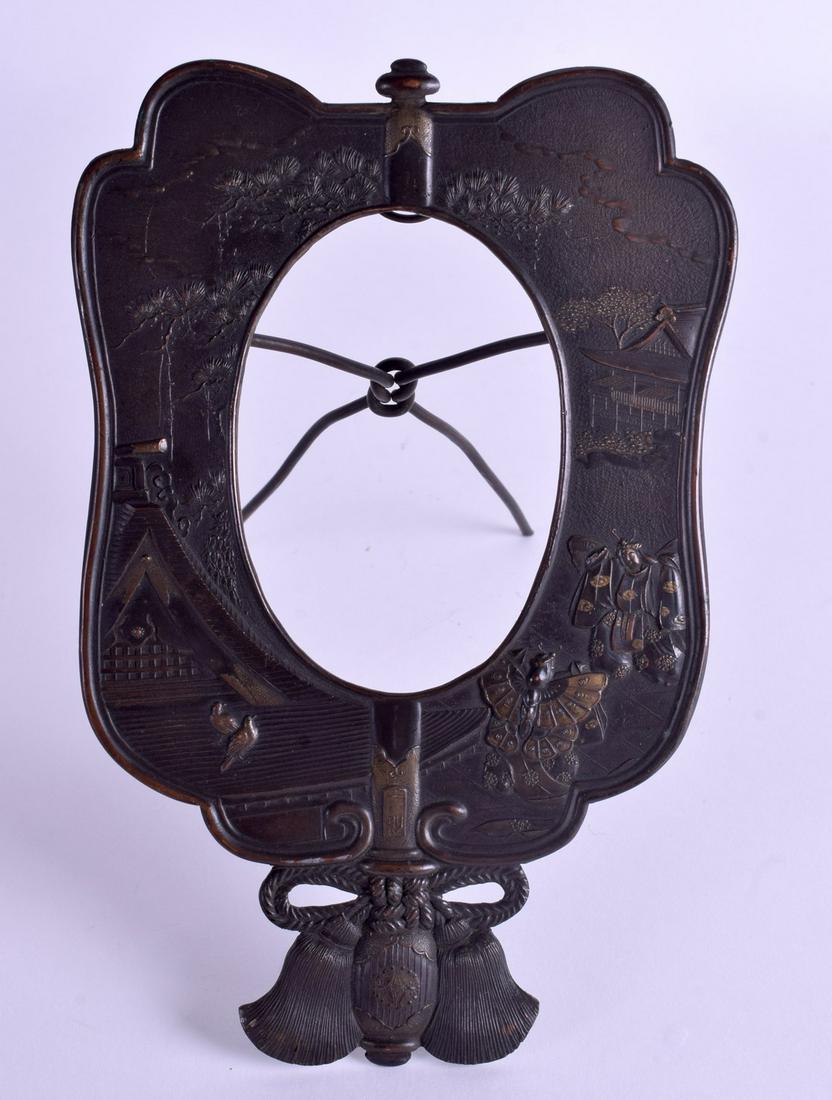 A 19TH CENTURY JAPANESE MEIJI PERIOD BRONZE AND COPPER: A 19TH CENTURY JAPANESE MEIJI PERIOD BRONZE AND COPPER FRAME decorated with figures within landscapes. 18 cm x 11 cm.