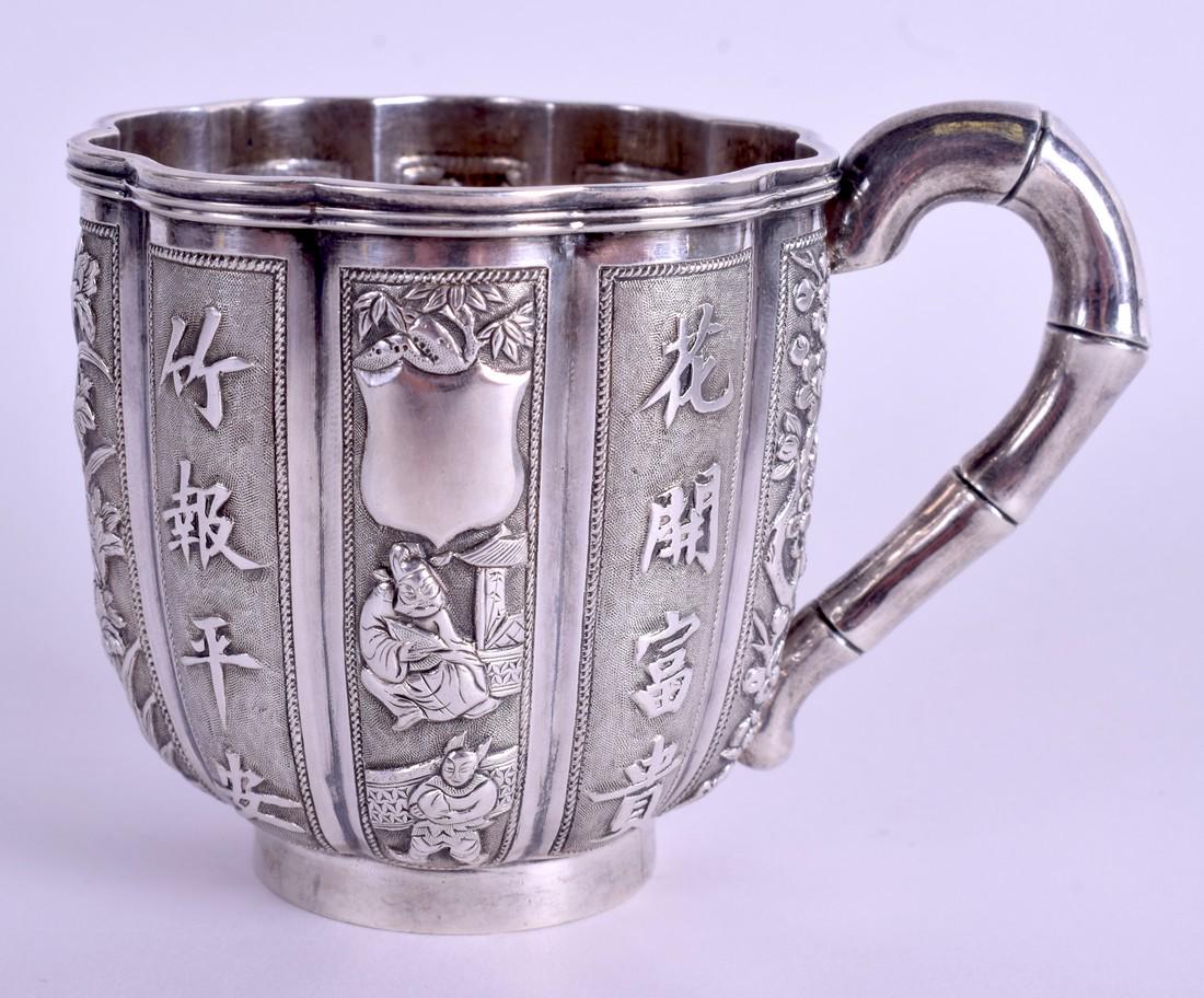 A 19TH CENTURY CHINESE EXPORT SILVER SCALLOPED MUG by (1 of 5)