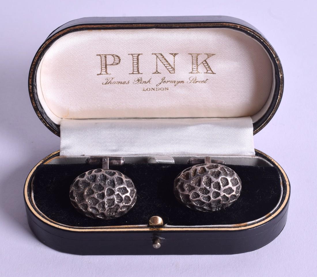 A PAIR OF SILVER CHRISTIAN DIOR SILVER CUFFLINKS. (1 of 3)