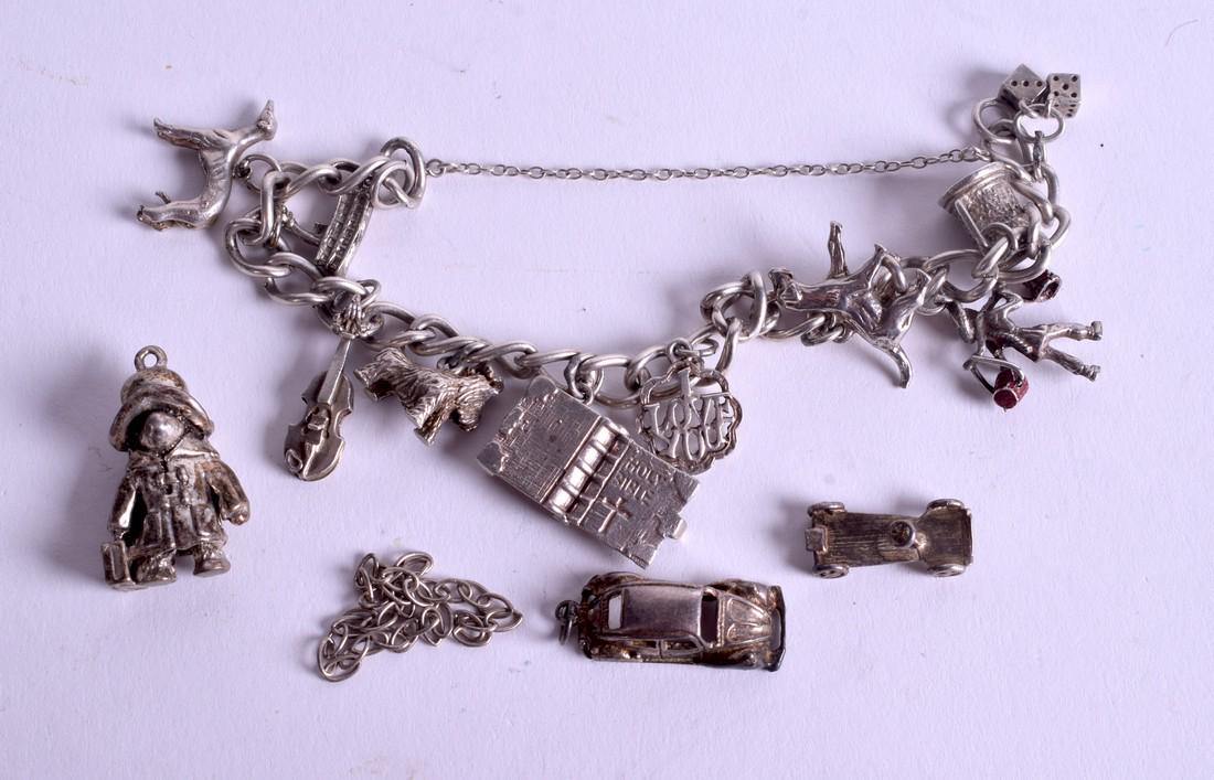 A SILVER CHARM BRACELET. 57 grams. (1 of 2)