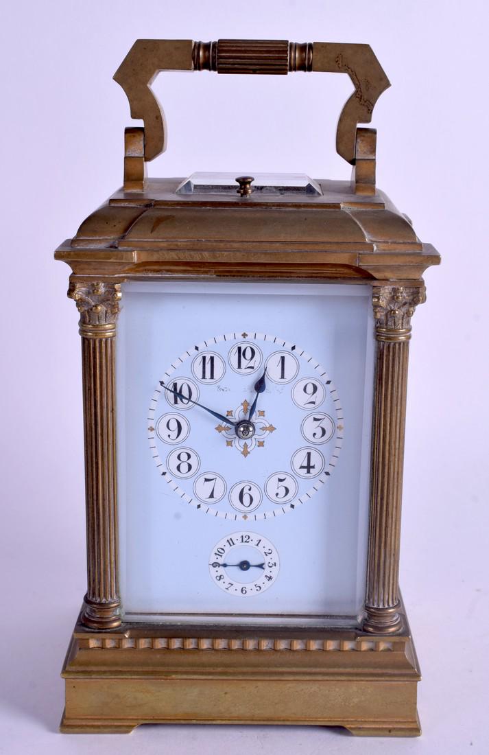 AN ANTIQUE FRENCH BRASS REPEATING PORCELAIN CARRIAGE: AN ANTIQUE FRENCH BRASS REPEATING PORCELAIN CARRIAGE CLOCK Grand & Petit Sonnerie features. 19 cm high inc handle.