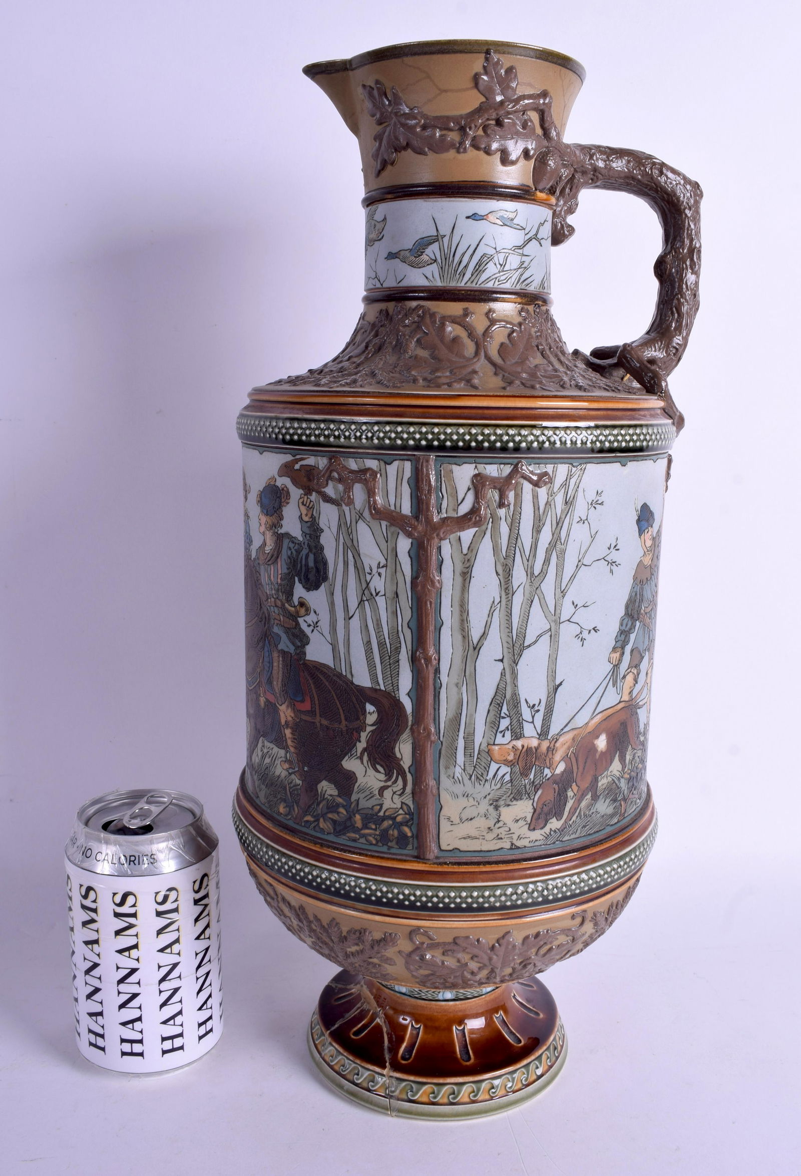 A LARGE ANTIQUE METTLACH STONEWARE HORSE EWER. 42 cm x