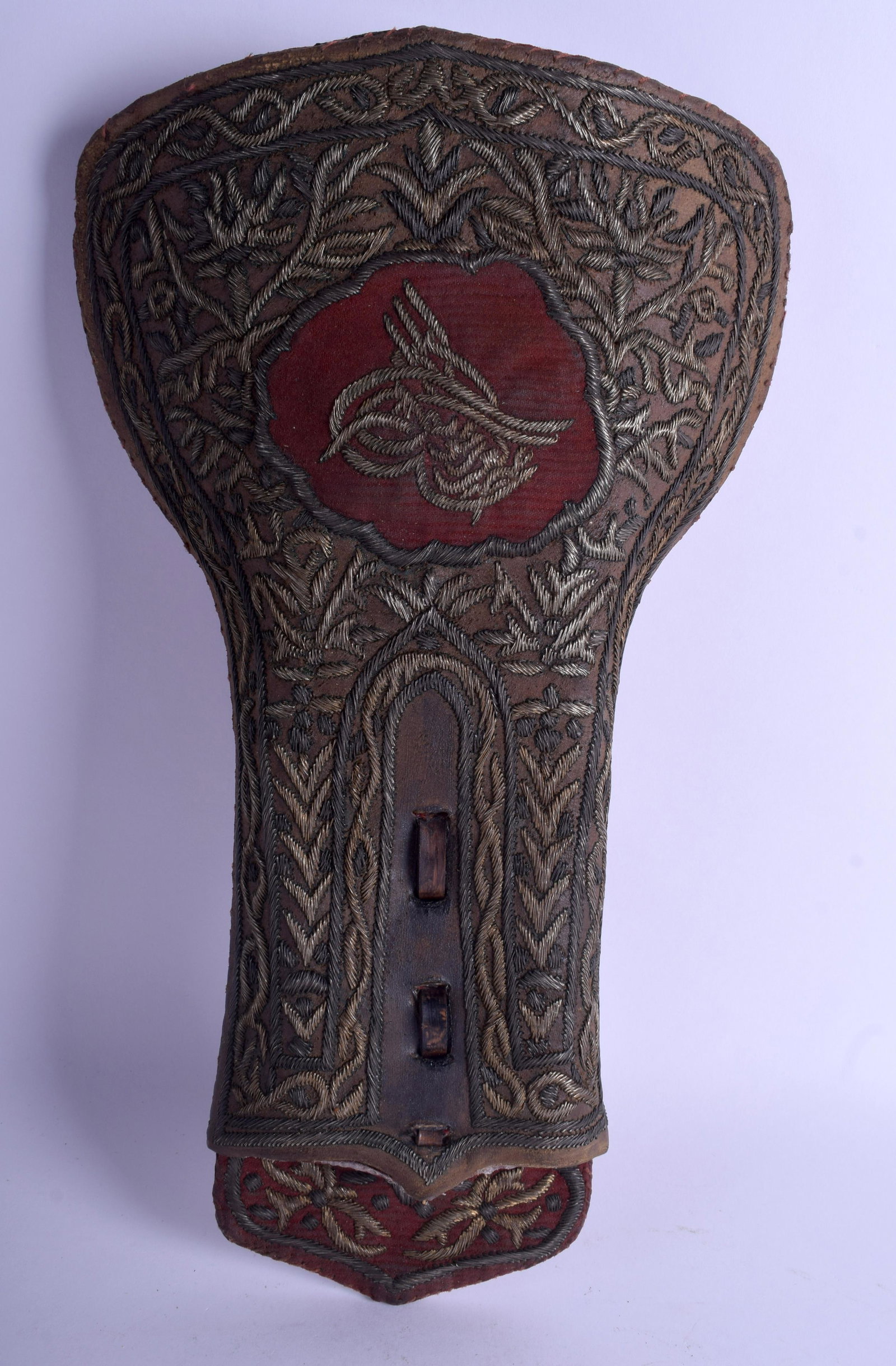 A RARE ANTIQUE OTTOMAN TURKISH DOUBLE PISTOL CARRIER: A RARE ANTIQUE OTTOMAN TURKISH DOUBLE PISTOL CARRIER decorated with foliage. 40 cm x 20 cm.