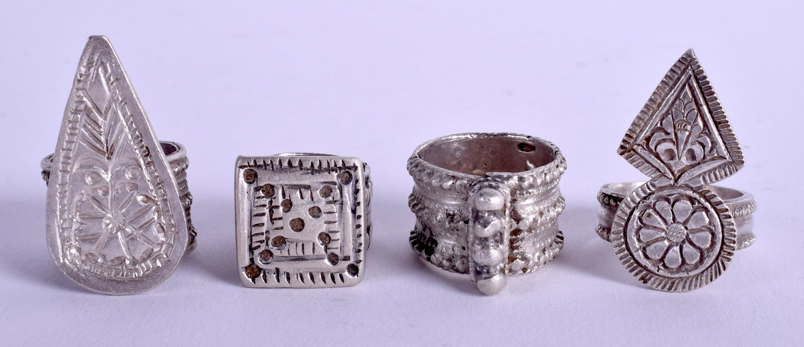 FOUR MIDDLE EASTERN SILVER RINGS. 1.9 oz. (4): FOUR MIDDLE EASTERN SILVER RINGS. 1.9 oz. (4)