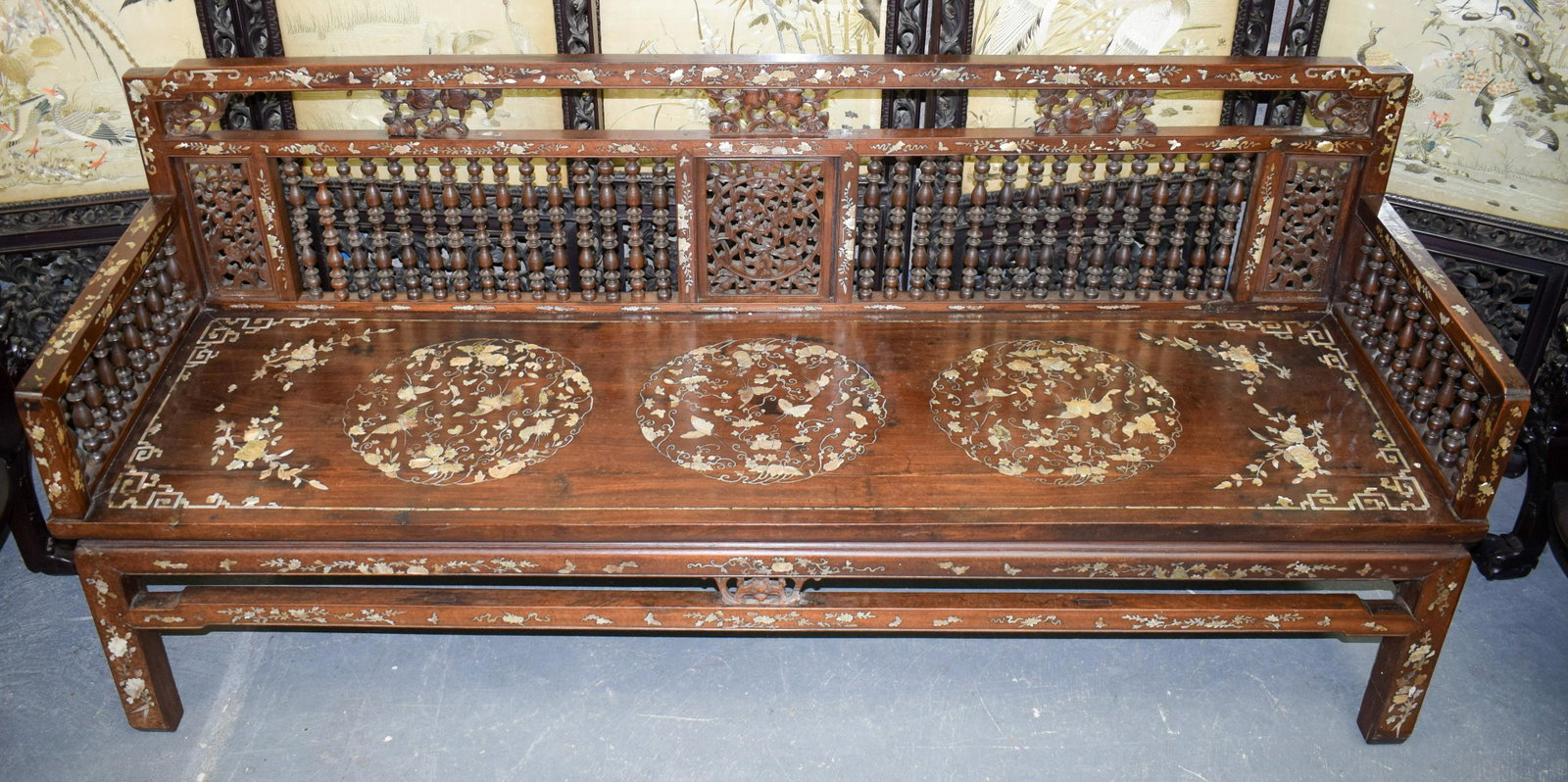 A FINE 19TH CENTURY CHINESE HARDWOOD MOTHER OF PEARL: A FINE 19TH CENTURY CHINESE HARDWOOD MOTHER OF PEARL INLAID BENCH decorated with figures and landscapes. 183 cm x 53 cm x 82 cm.