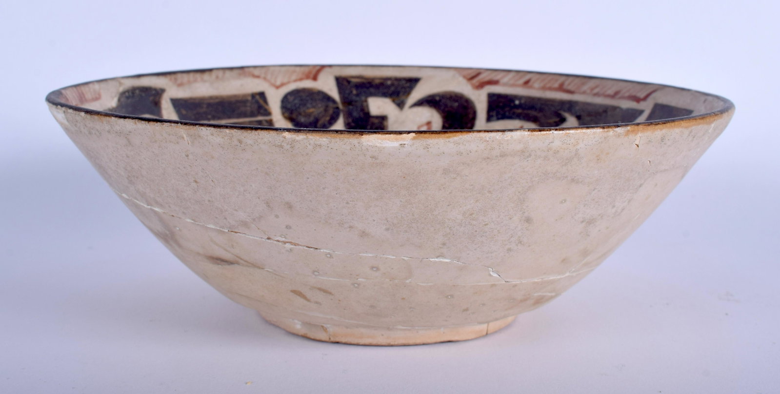 A MIDDLE EASTERN KASHAN BOWL. 19 cm diameter.: A MIDDLE EASTERN KASHAN BOWL. 19 cm diameter.
