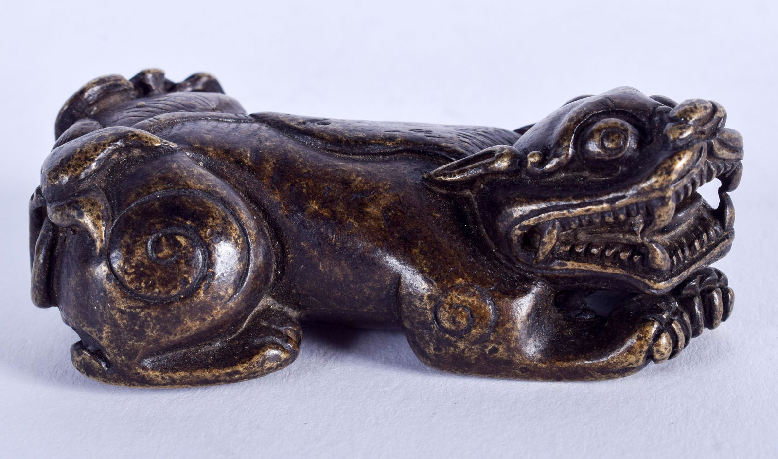 A CHINESE BUDDHISTIC LION BRONZE SCROLL WEIGHT. 7 cm (1 of 3)