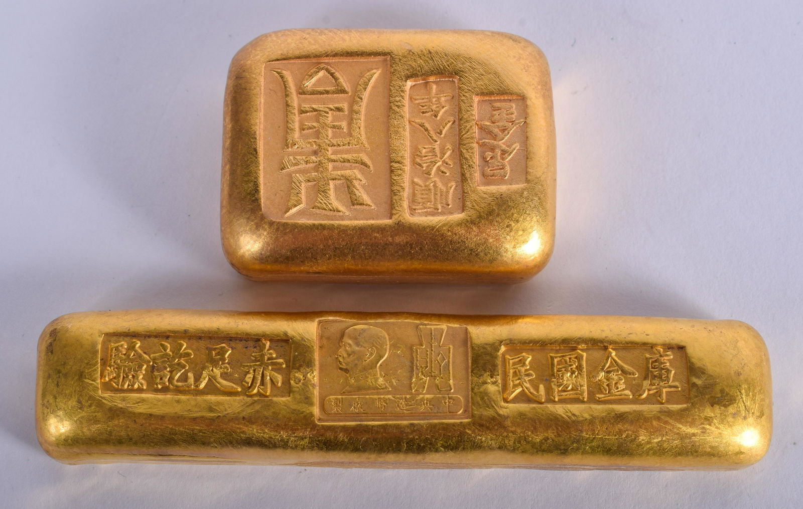 TWO CHINESE YELLOW METAL INGOTS. 340 grams. (2) (1 of 2)
