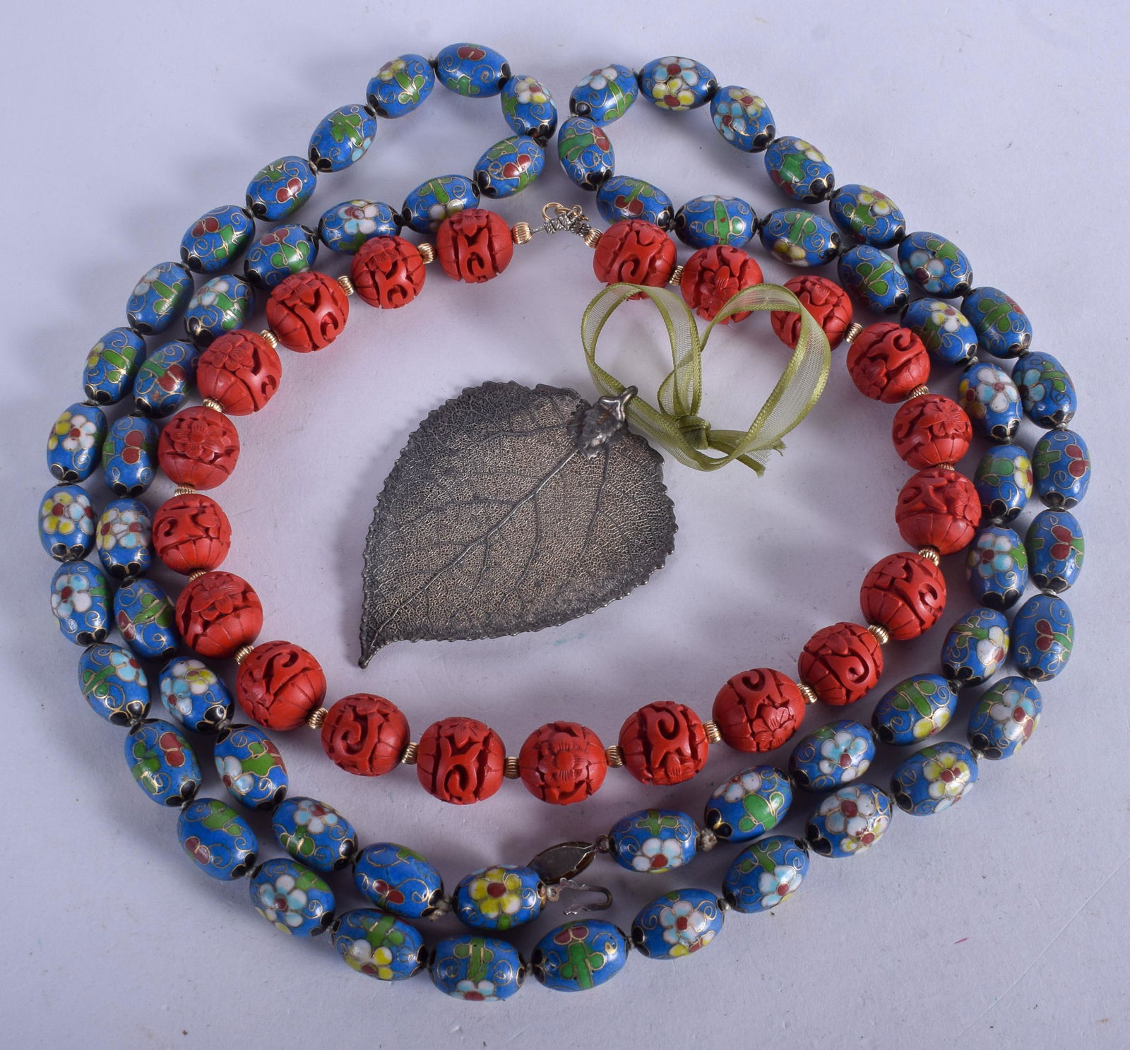 TWO CHINESE NECKLACES and a leaf. (3) (1 of 3)