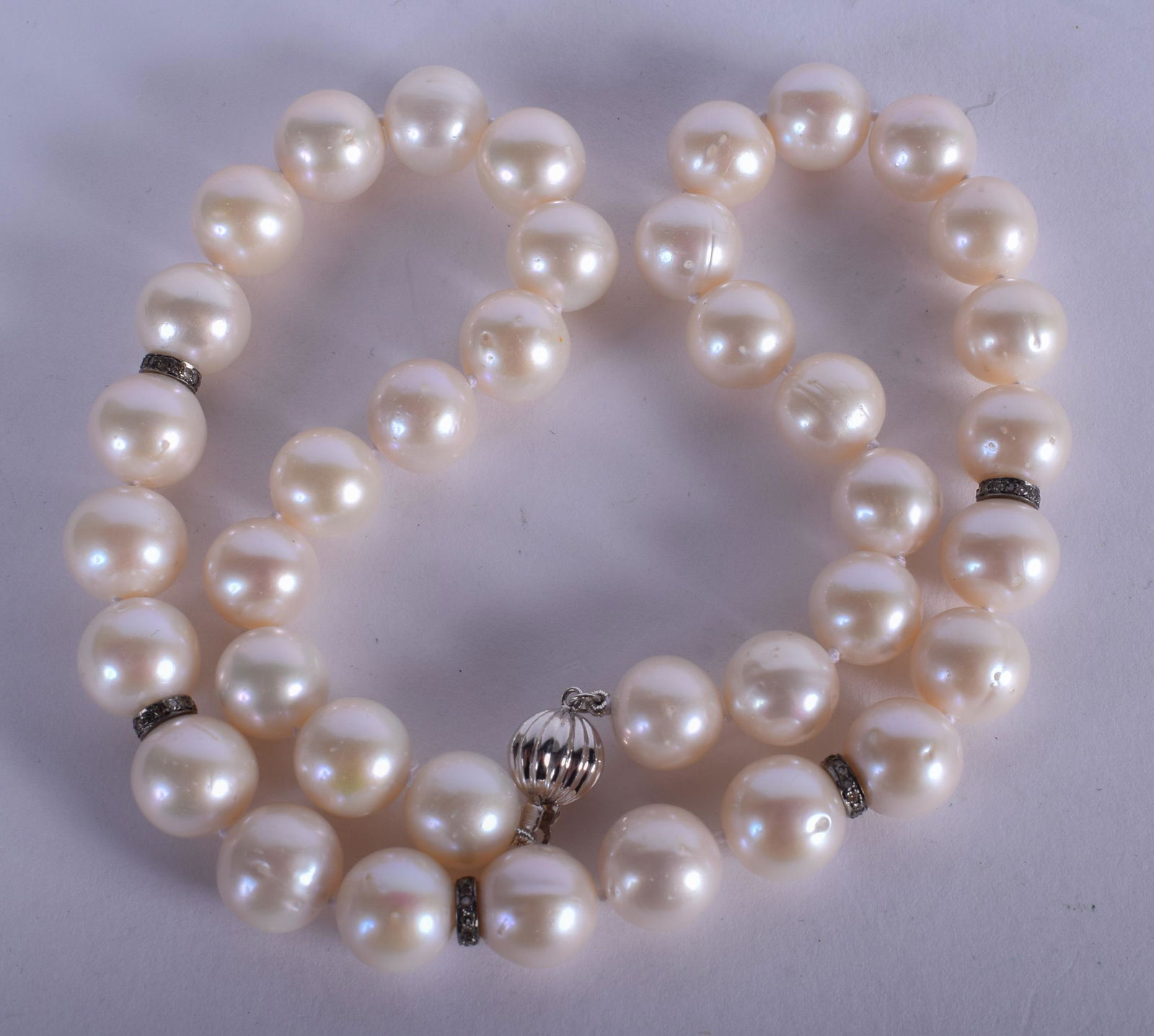 AN 18CT GOLD DIAMOND AND PEARL NECKLACE. 44 cm long. (1 of 2)