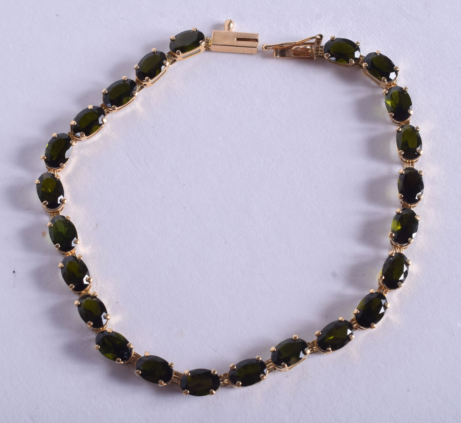 A 14CT GOLD AND TOURMALINE BRACELET. 17 cm long. (1 of 3)