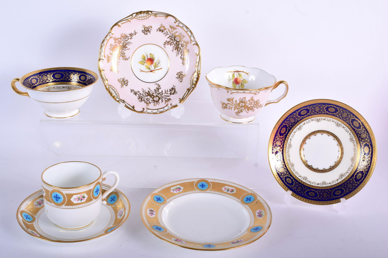19TH CENTURY MINTON COFFEE CUP, SAUCER AND SIDE PLATE: 19TH CENTURY MINTON COFFEE CUP, SAUCER AND SIDE PLATE with turquoise and floral panels on an acid etched border and two gold marked Minton cups and saucers, a acid etched blue and gilt bordered teacup