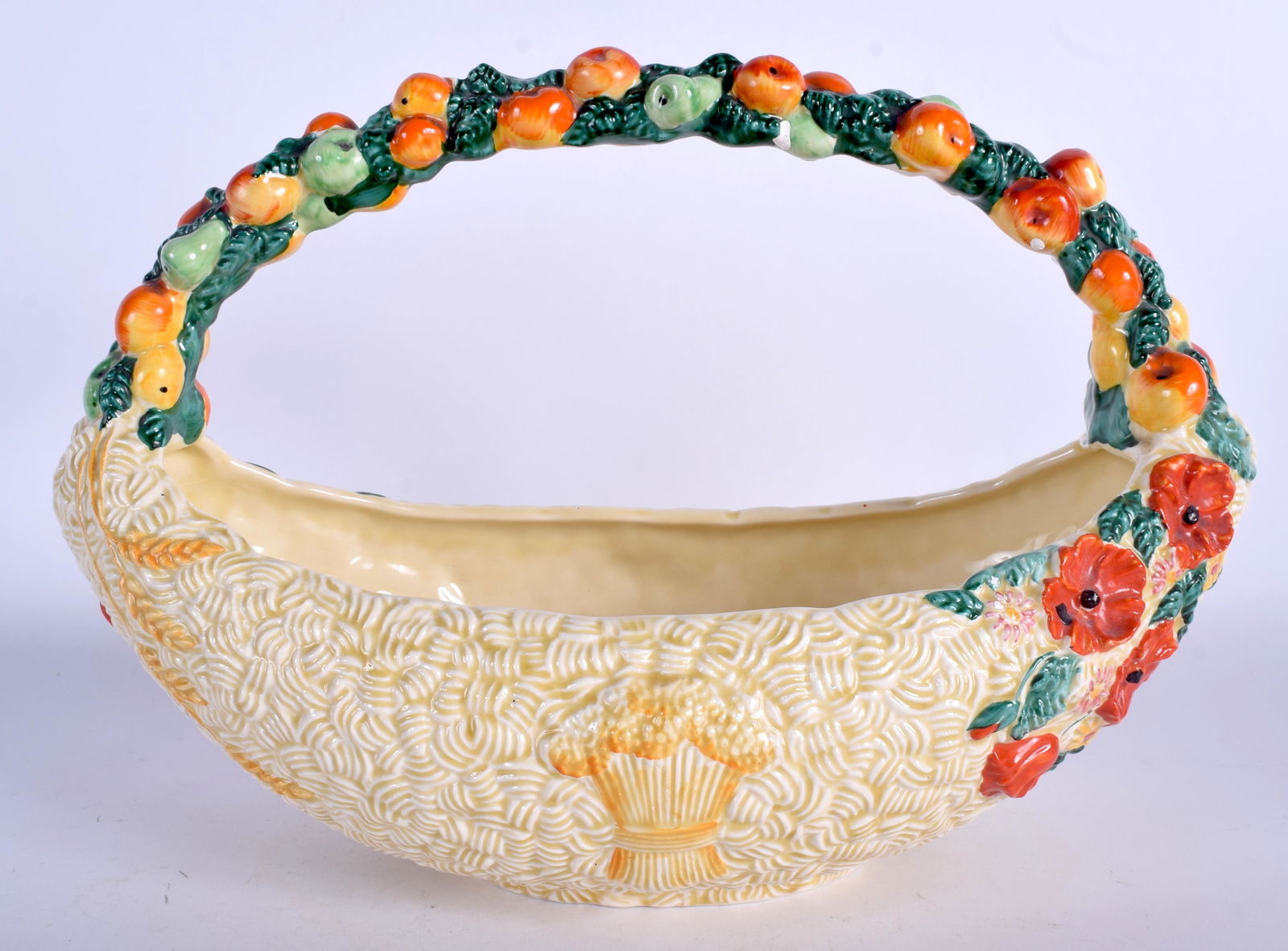 A CLARICE CLIFF NEWPORT POTTERY HARVEST BASKET. 30 cm x: A CLARICE CLIFF NEWPORT POTTERY HARVEST BASKET. 30 cm x 23 cm.