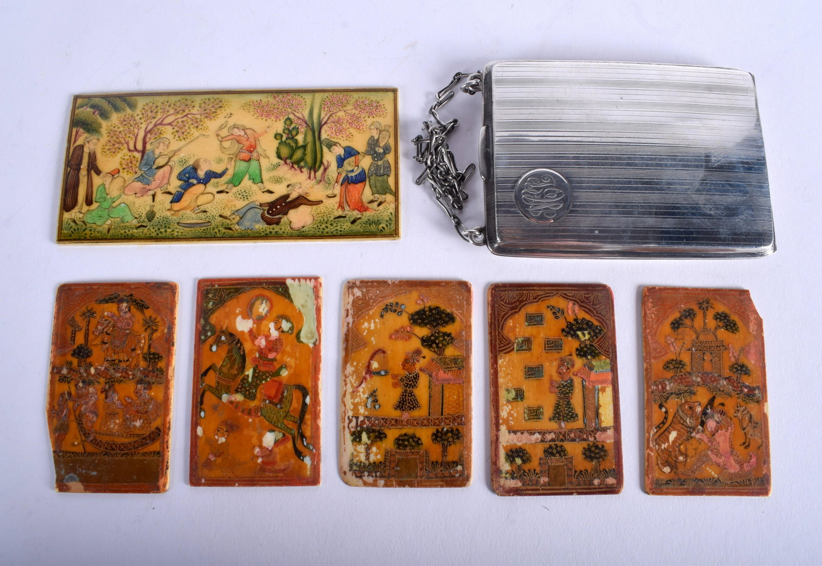 A SILVER COMBINATION COMPACT together with six plaques: A SILVER COMBINATION COMPACT together with six plaques C1910. (7)