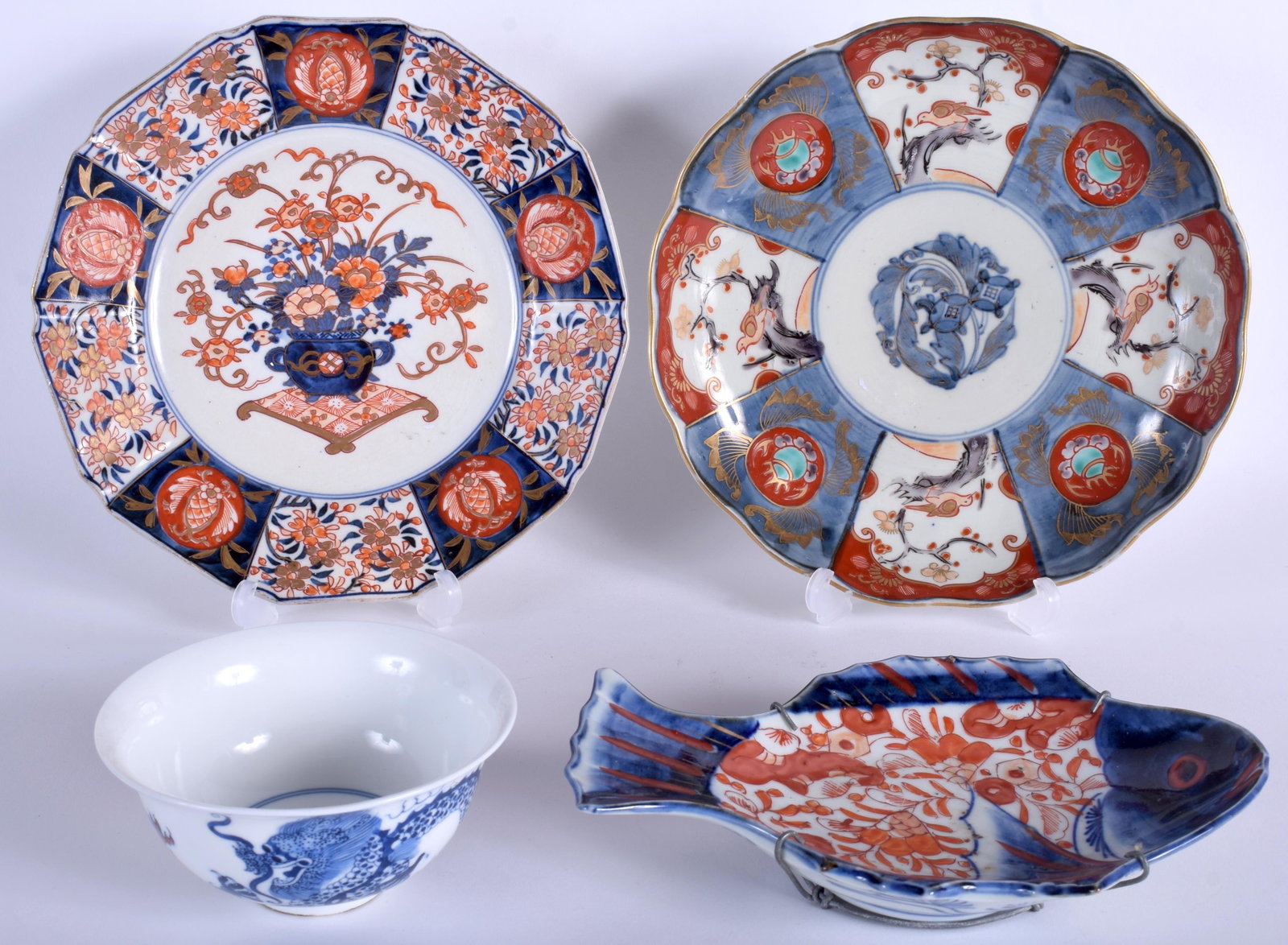 TWO 18TH CENTURY JAPANESE EDO PERIOD IMARI DISHES: TWO 18TH CENTURY JAPANESE EDO PERIOD IMARI DISHES together with a fish and a porcelain bowl. Largest 21 cm wide. (4)