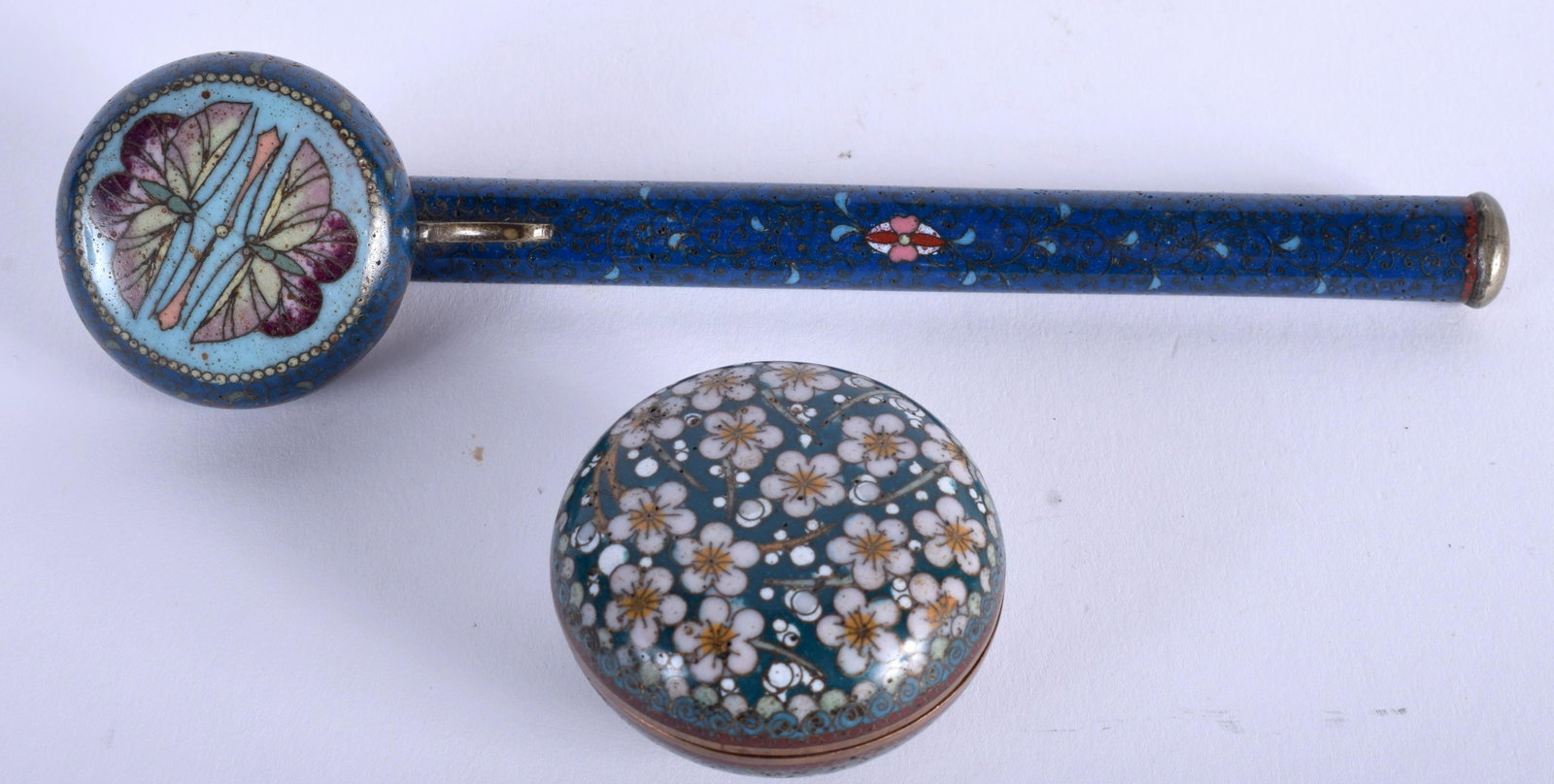 A RARE 19TH CENTURY JAPANESE MEIJI PERIOD CLOISONNE: A RARE 19TH CENTURY JAPANESE MEIJI PERIOD CLOISONNE ENAMEL PIPE together with a cloisonne enamel box & cover. 18 cm wide, box 4.5 cm diameter. (2)