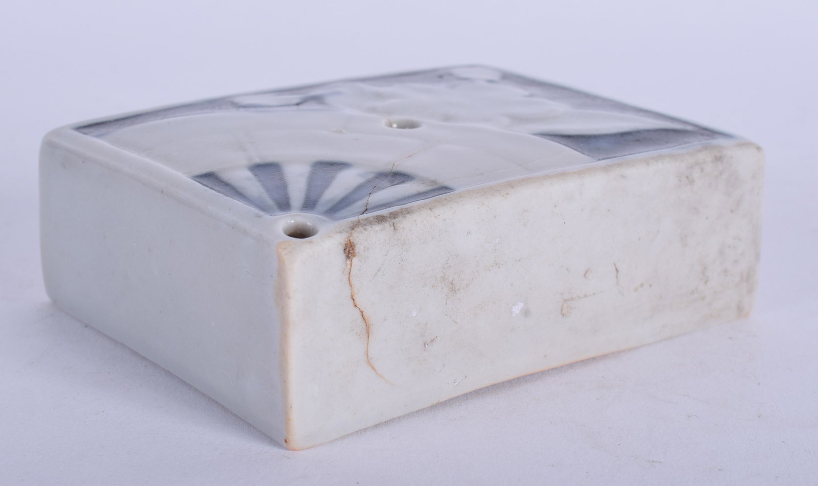 A 17TH/18TH CENTURY CHINESE KOREAN BLUE AND WHITE WATER: A 17TH/18TH CENTURY CHINESE KOREAN BLUE AND WHITE WATER DROPPER of rectangular form. 8.5 cm x 6.5 cm.
