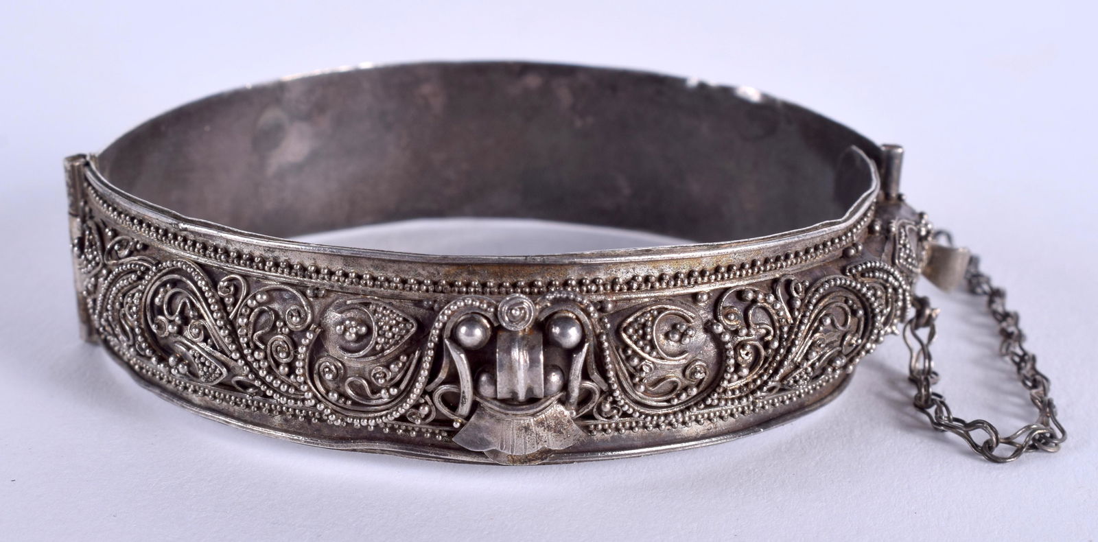 AN ANTIQUE SILVER BANGLE. 6.25 cm wide. (1 of 3)