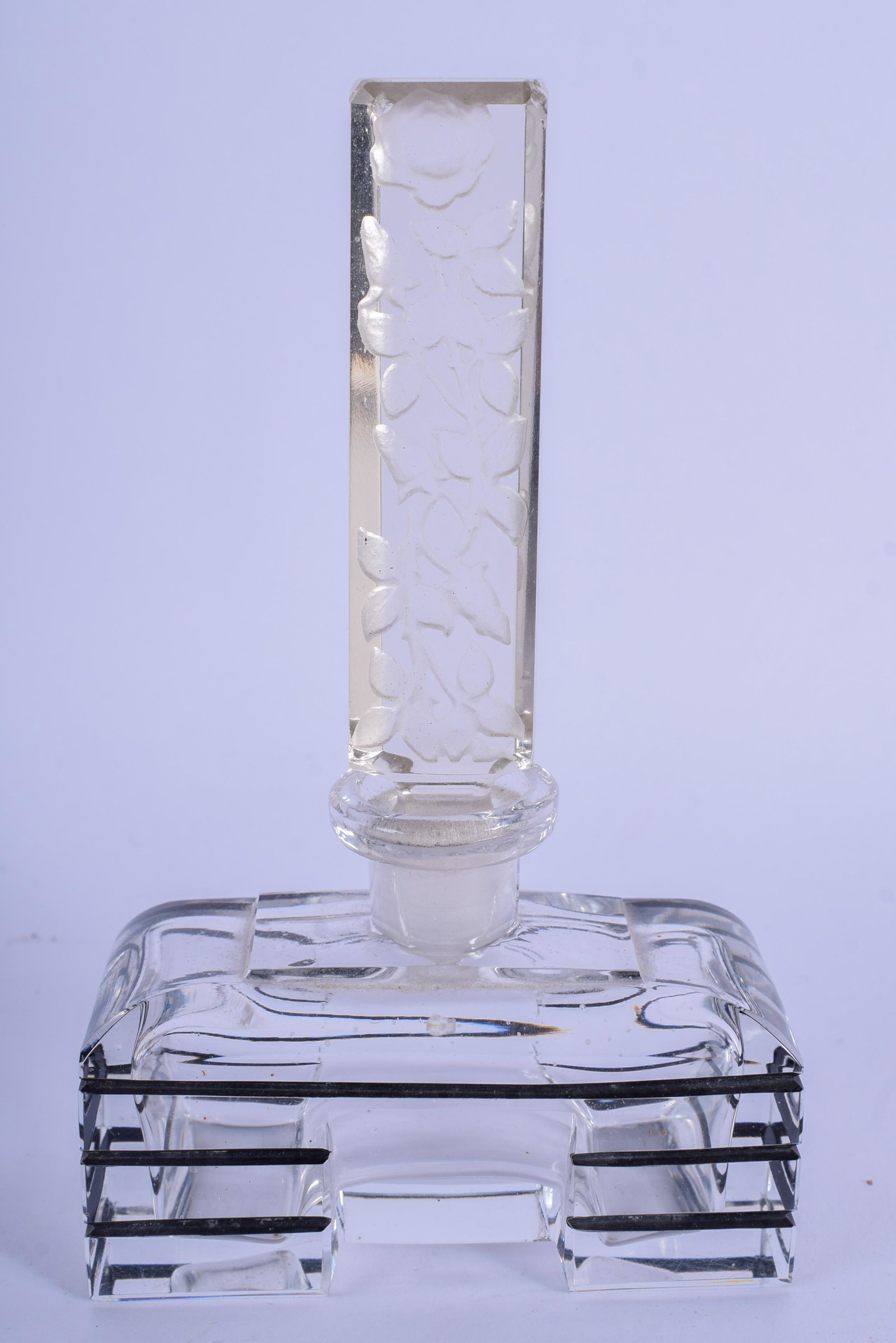 A FRENCH ART DECO GLASS SCENT BOTTLE AND STOPPER. 12 cm: A FRENCH ART DECO GLASS SCENT BOTTLE AND STOPPER. 12 cm x 7.5 cm.