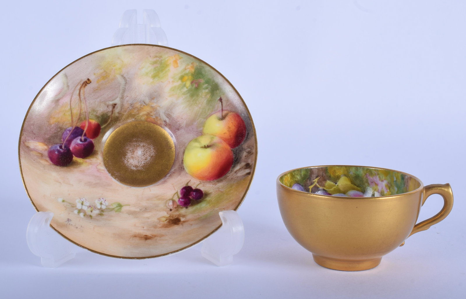 AN ANTIQUE ROYAL WORCESTER FRUIT PAINTED CUP & SAUCER: AN ANTIQUE ROYAL WORCESTER FRUIT PAINTED CUP & SAUCER painted by Ricketts & Harper. (2)