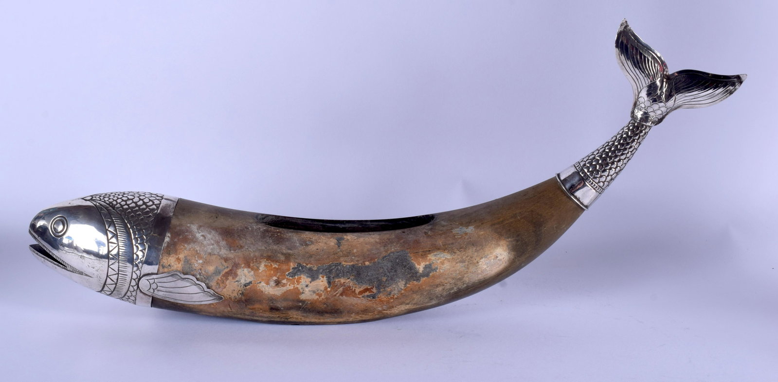 A LARGE MIDDLE EASTERN ISLAMIC SILVER MOUNTED HORN: A LARGE MIDDLE EASTERN ISLAMIC SILVER MOUNTED HORN INCENSE BURNER. 39 cm wide.