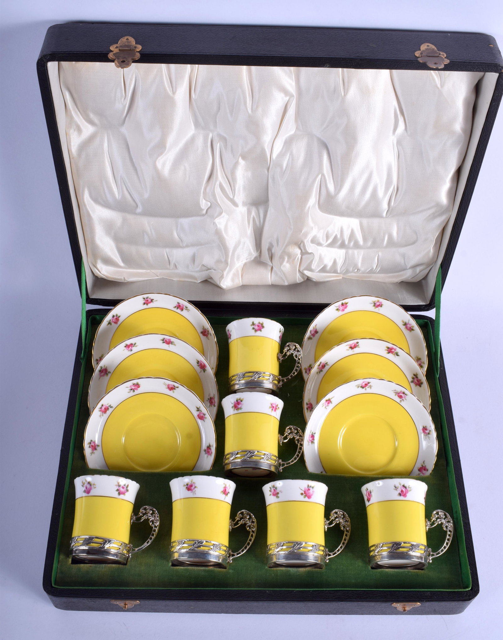 AN ANTIQUE ROYAL WORCESTER SILVER AND PORCELAIN SET OF: AN ANTIQUE ROYAL WORCESTER SILVER AND PORCELAIN SET OF CUPS AND SAUCERS. Silver 4.6 oz. (12)