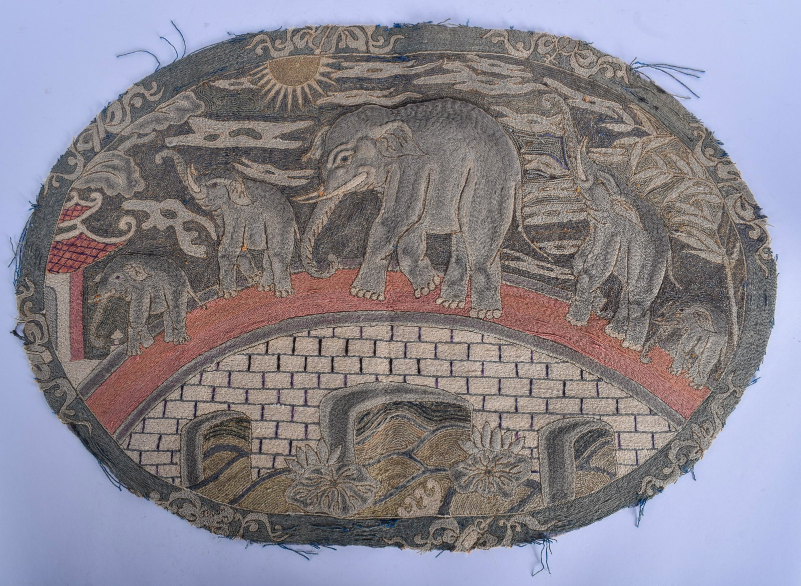 A 19TH CENTURY JAPANESE MEIJI PERIOD EMBROIDERED SILK: A 19TH CENTURY JAPANESE MEIJI PERIOD EMBROIDERED SILK PANEL depicting roaming elephants. 60 cm x 40 cm.