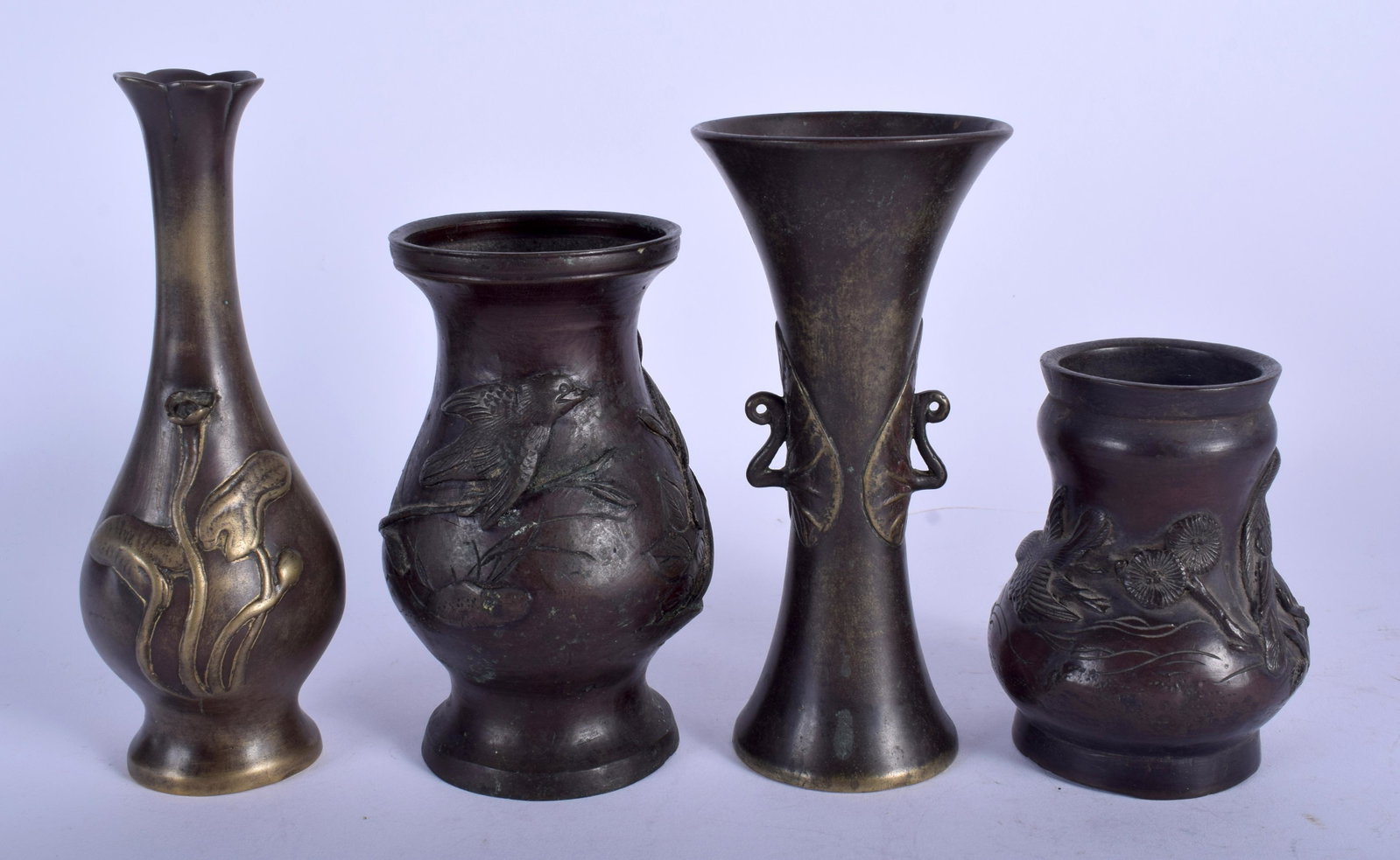FOUR 19TH century JAPANESE MEIJI PERIOD BRONZE VASES in: FOUR 19TH century JAPANESE MEIJI PERIOD BRONZE VASES in various forms and sizes. Largest 17 cm high. (4)