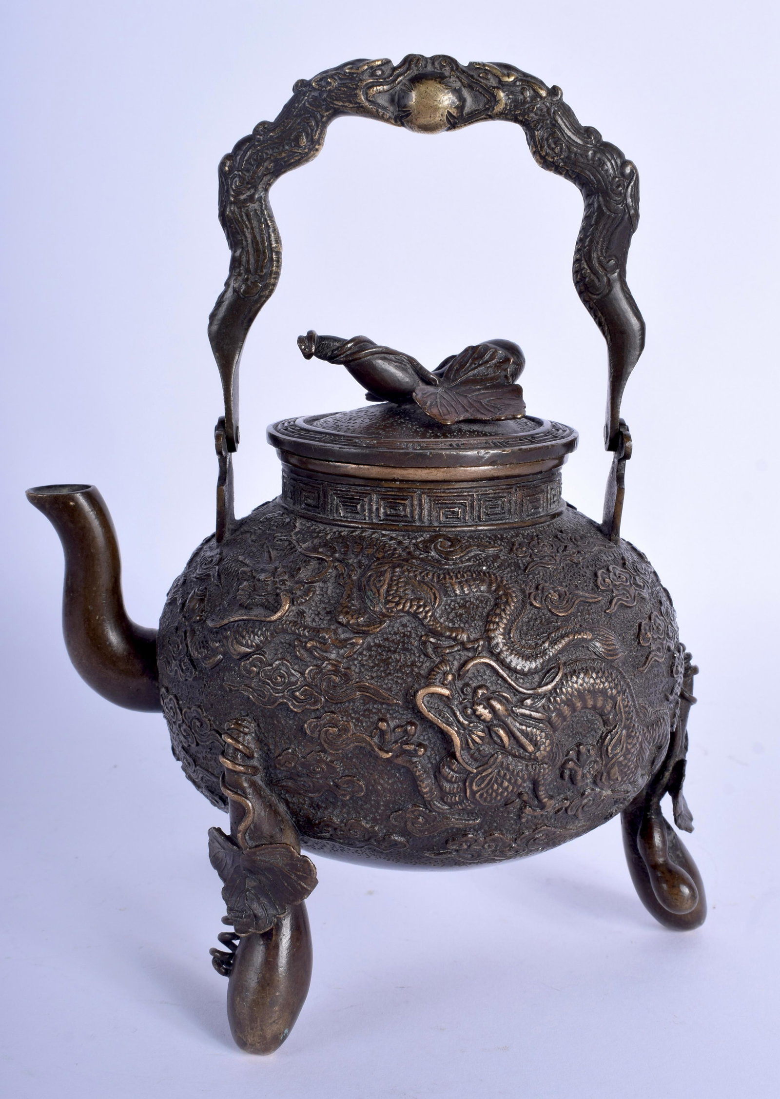 A GOOD 19TH CENTURY JAPANESE MEIJI PERIOD BRONZE TEAPOT: A GOOD 19TH CENTURY JAPANESE MEIJI PERIOD BRONZE TEAPOT AND COVER decorated with dragons. 19 cm x 12 cm.