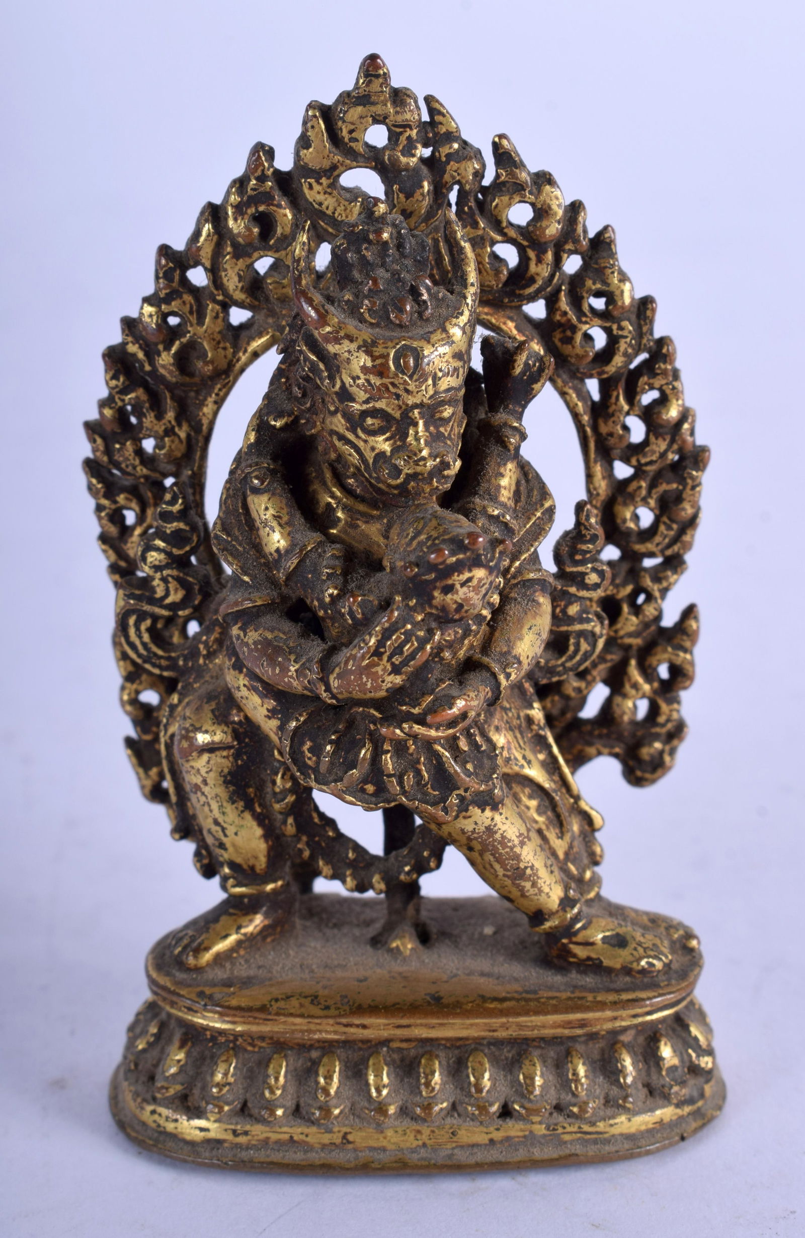 AN 18TH/19TH CENTURY CHINESE TIBETAN BRONZE BUDDHA: AN 18TH/19TH CENTURY CHINESE TIBETAN BRONZE BUDDHA modelled upon a shaped base. 7.5 cm x 4.5 cm.