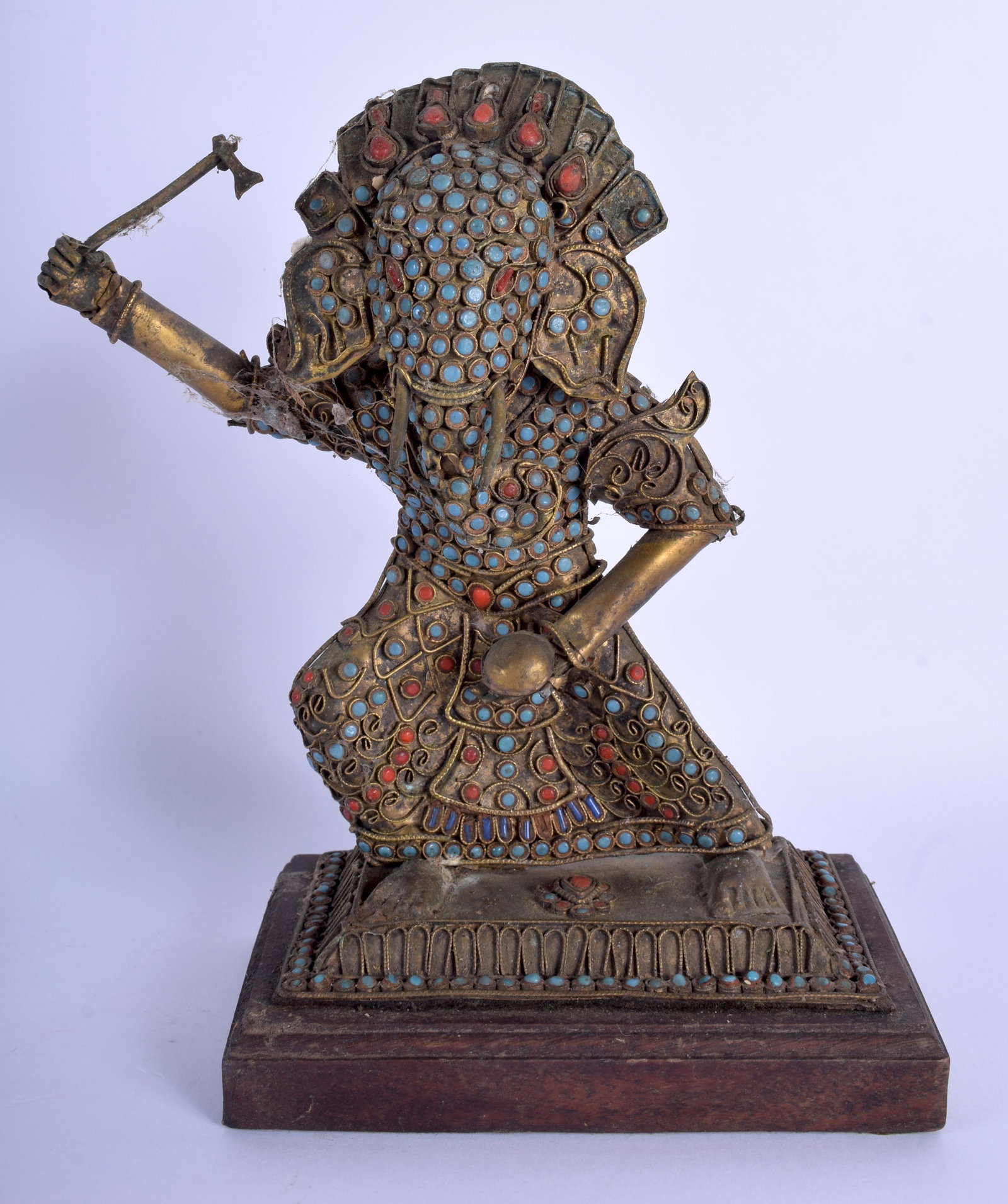 A 19TH CENTURY CHINESE TIBETAN BRASS ALLOY CORAL AND: A 19TH CENTURY CHINESE TIBETAN BRASS ALLOY CORAL AND TURQUOISE BUDDHIST FIGURE. 20 cm x 11 cm.