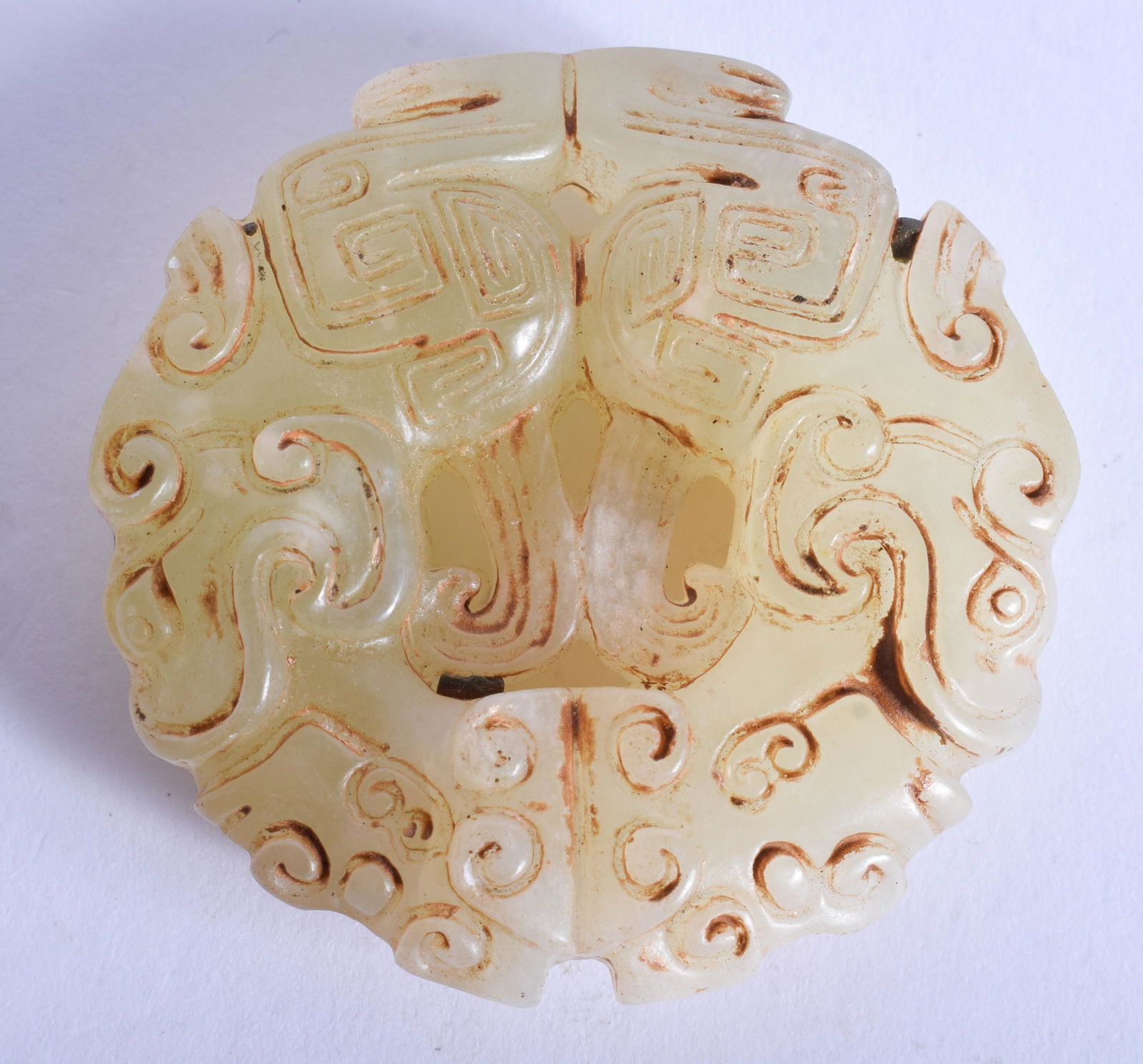 A CHINESE JADE ROUNDEL. 5.5 cm wide. (1 of 2)