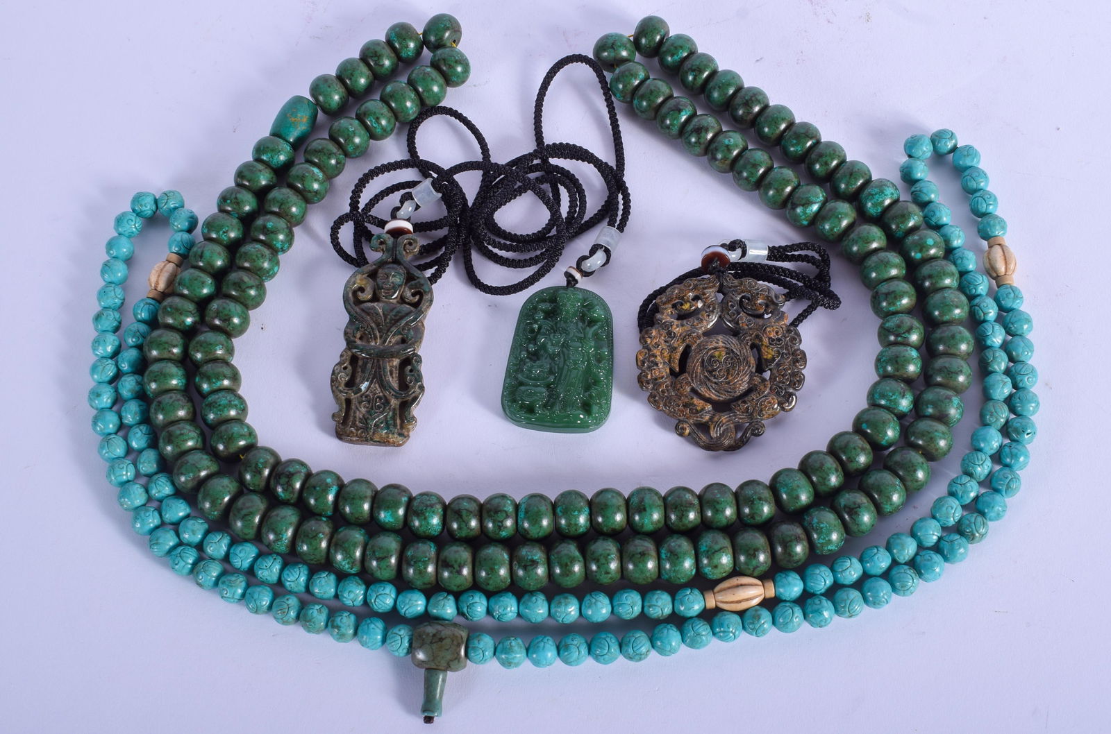 TWO MIDDLE EASTERN TURQUOISE NECKLACES together with (1 of 4)