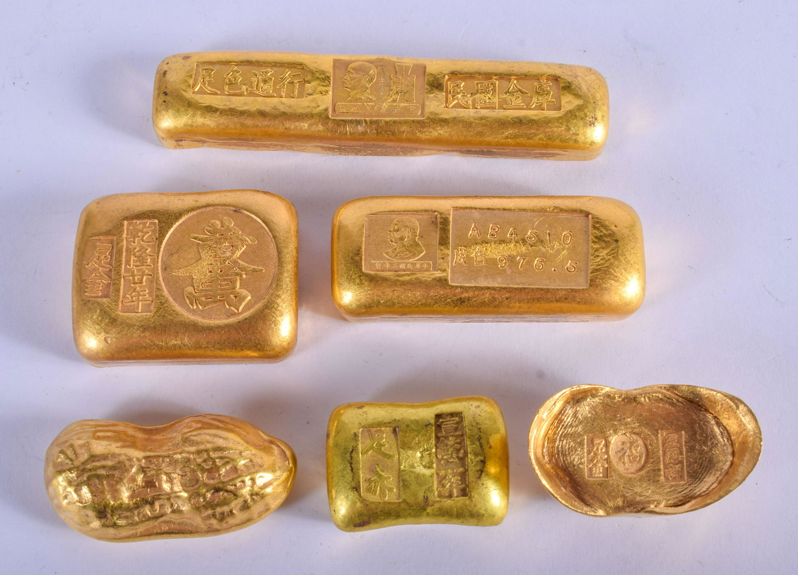 SIX CHINESE YELLOW METAL BARS. 815 grams. Largest 9.5 (1 of 1)