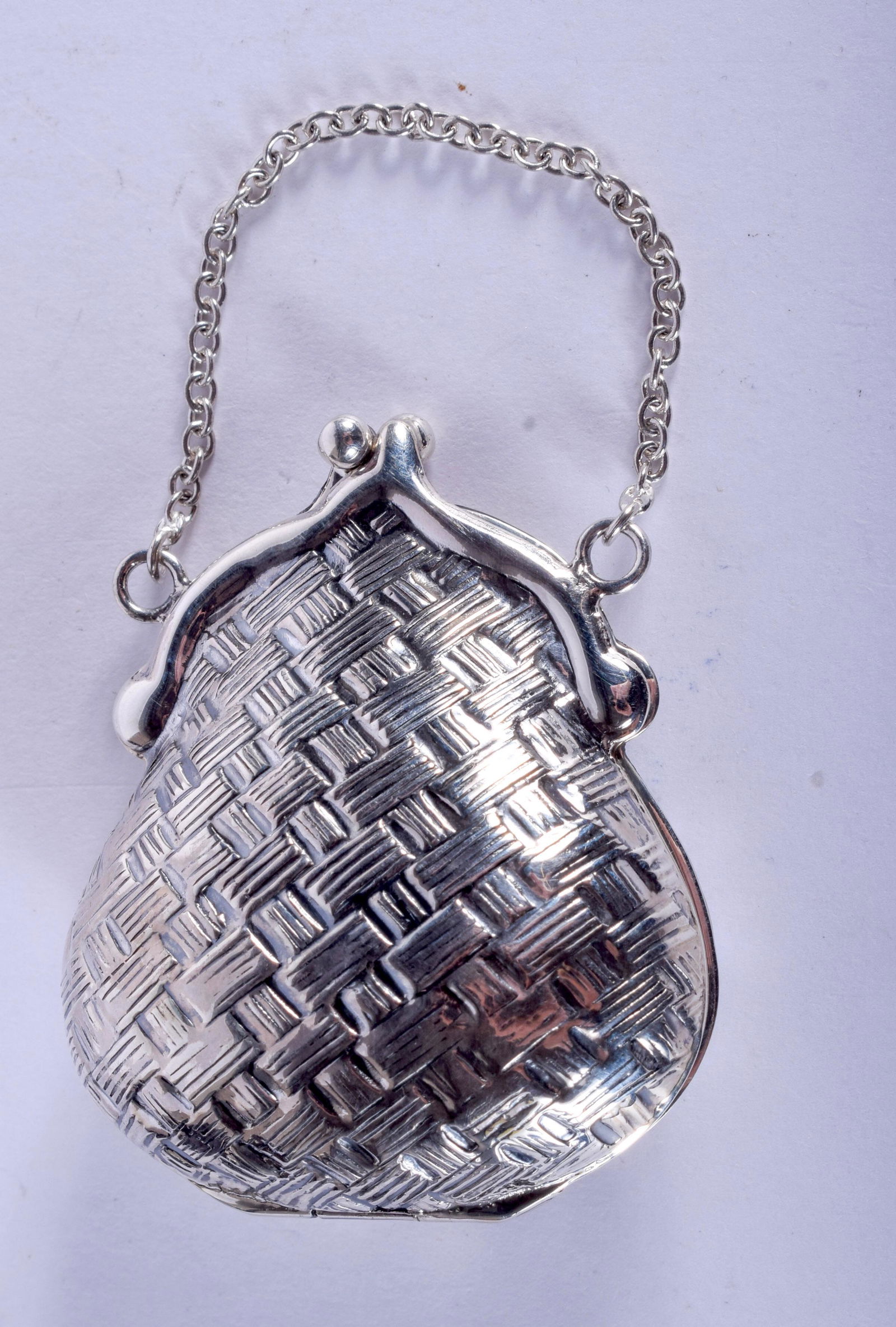 A SILVER PURSE. 4.5 cm x 3.5 cm. (1 of 3)