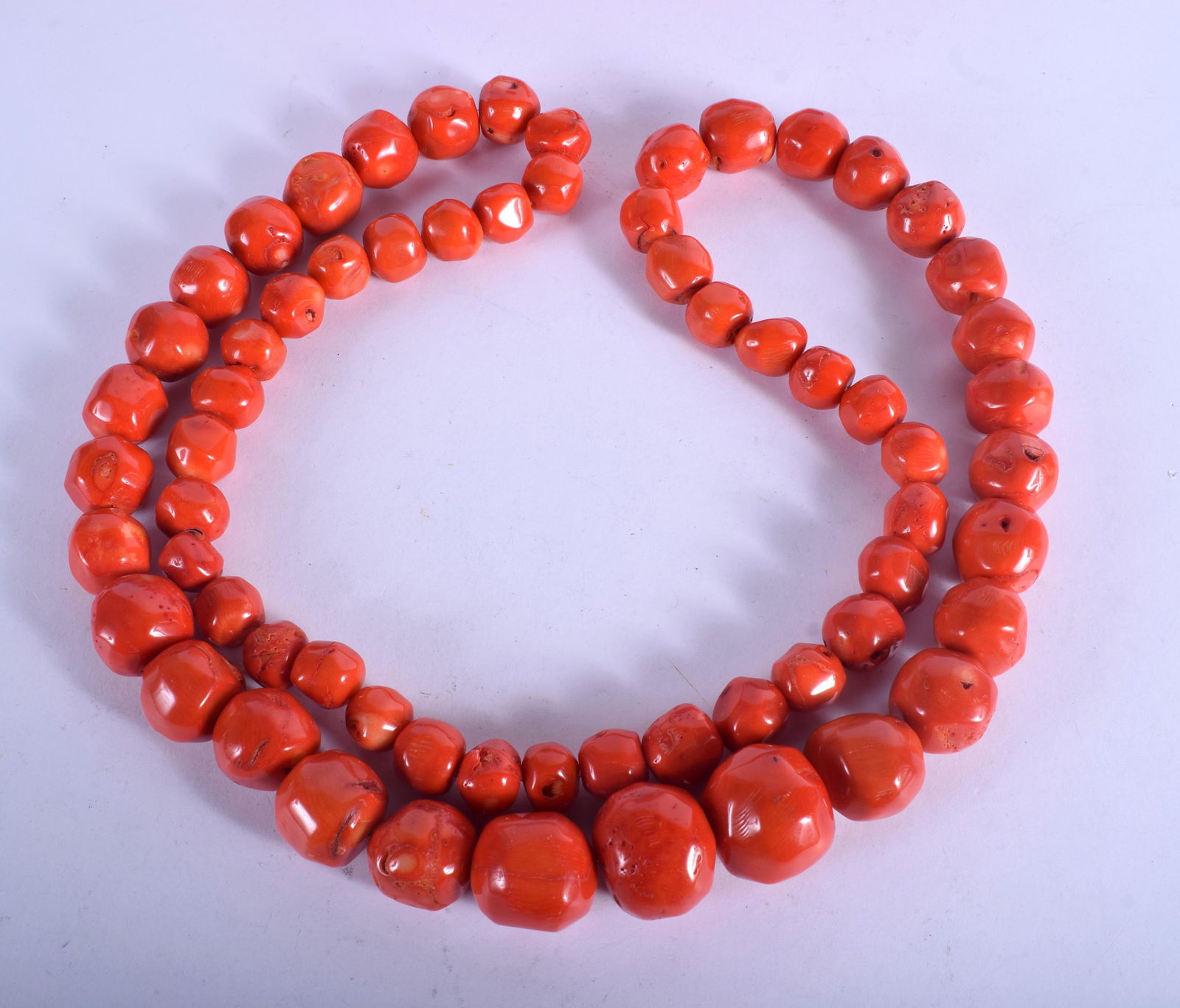 A LARGE CORAL NECKLACE. 112 cm long. (1 of 2)